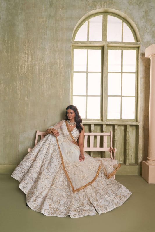 Off White Embroidered Party wear Lehenge Choli